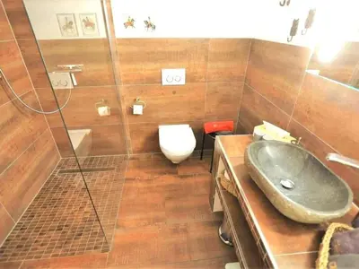 Ein Badezimmer in der Unterkunft Holiday Home Wellness-Chalet by Interhome