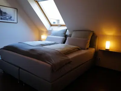 Ein Bett oder Betten in einem Zimmer der Unterkunft Apartment Wohnung in Pünderich mit Terrasse by Interhome
