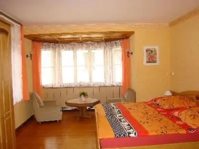 Ein Bett oder Betten in einem Zimmer der Unterkunft Holiday Home Altes Winzerhaus in Mesenich by Interhome