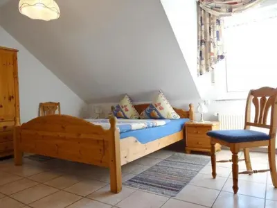 Ein Bett oder Betten in einem Zimmer der Unterkunft Apartment für bis zu fünf Personen by Interhome