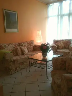 Ein Sitzbereich in der Unterkunft Ferienwohnung Mosel-Rhein
