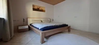 Ein Bett oder Betten in einem Zimmer der Unterkunft Ferienwohnung Thomas