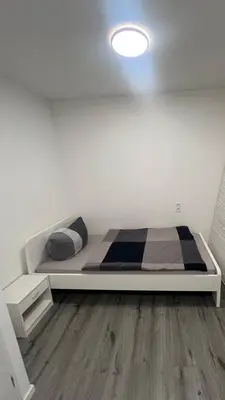 Ein Bett oder Betten in einem Zimmer der Unterkunft Häusliche Wohnung in Koblenz WE15