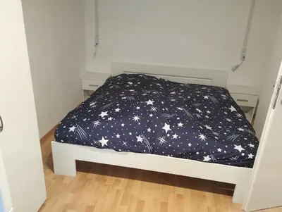 Ein Bett oder Betten in einem Zimmer der Unterkunft Ferienhaus check ferien dot world