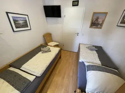 Ein Bett oder Betten in einem Zimmer der Unterkunft Dahlke with fireplace and sauna