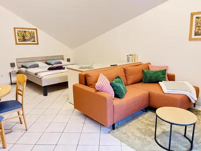 Ein Bett oder Betten in einem Zimmer der Unterkunft Ferienwohnungen Weingut Breit
