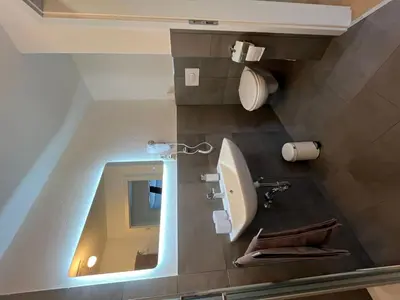 Ein Badezimmer in der Unterkunft Apartment Haus Budinger by Interhome