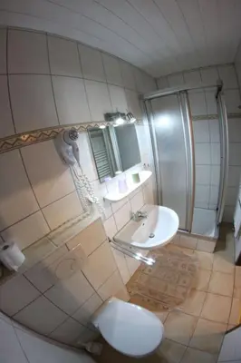 Ein Badezimmer in der Unterkunft Apartment Haus Budinger by Interhome