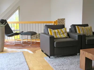 Ein Sitzbereich in der Unterkunft Moselschön Das Ferienhaus