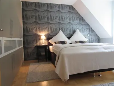 Ein Bett oder Betten in einem Zimmer der Unterkunft Moselschön Das Ferienhaus