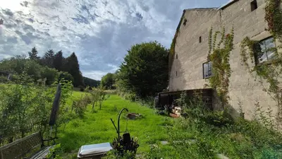 Ein Garten an der Unterkunft Ringhaus Welschenbach
