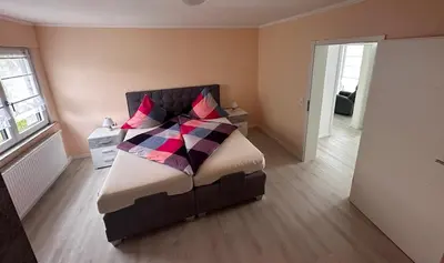 Ein Bett oder Betten in einem Zimmer der Unterkunft Ferienwohnung Lena