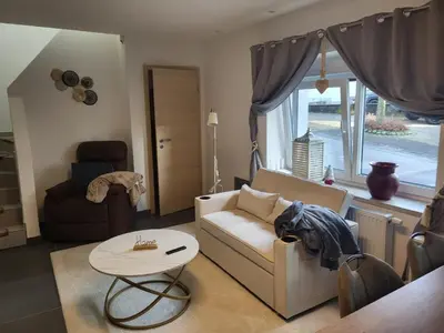 Ein Sitzbereich in der Unterkunft Ferienhaus Neunkirchen-Daun