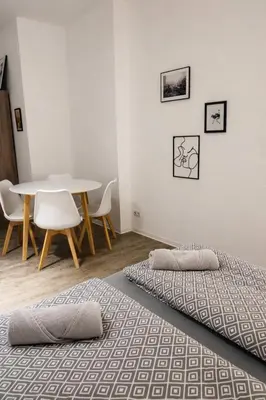 Ein Bett oder Betten in einem Zimmer der Unterkunft Komfort Apartment nahe Hauptbahnhof Koblenz