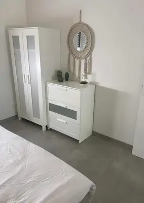 Ein Bett oder Betten in einem Zimmer der Unterkunft Ferienwohnung in der wunderschönen Eifel