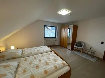 Ein Bett oder Betten in einem Zimmer der Unterkunft Ferienwohnung Adelheid Brachtendorf
