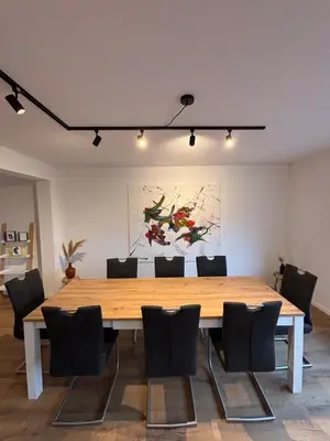 Ein Sitzbereich in der Unterkunft Ferienhaus an der Burg Coraidelstein