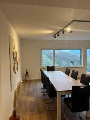 Ein Sitzbereich in der Unterkunft Ferienhaus an der Burg Coraidelstein