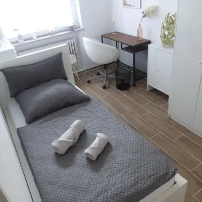 Ein Bett oder Betten in einem Zimmer der Unterkunft ChrisTho - Am Rheinsteig