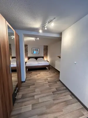 Ein Bett oder Betten in einem Zimmer der Unterkunft Aparts4ring 5 Nürburg