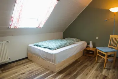 Ein Bett oder Betten in einem Zimmer der Unterkunft Ferienwohnung Frings