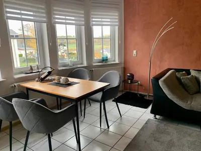 Ein Sitzbereich in der Unterkunft Ferienwohnung Kaspers