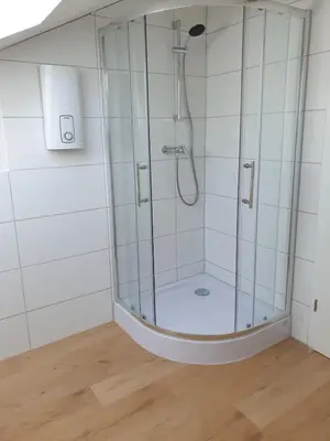 Ein Badezimmer in der Unterkunft Ruhige Dachgeschosswohnung mit Sauna, Balkon, Aussicht