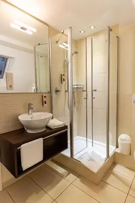 Ein Badezimmer in der Unterkunft Pension und Restaurant Zur kleinen Rebe