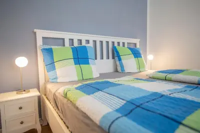 Ein Bett oder Betten in einem Zimmer der Unterkunft Ferienhaus zum Brauneberg