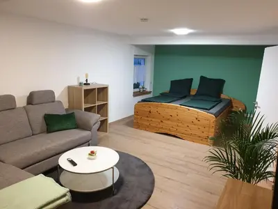 Ein Sitzbereich in der Unterkunft Ferienwohnung zur Honigschleife