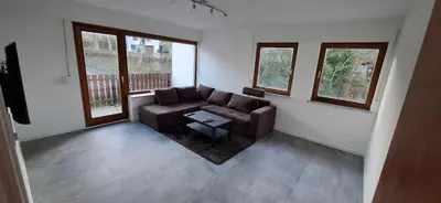 Ein Sitzbereich in der Unterkunft Haus Hoffeld