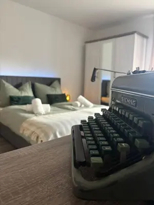 Ein Bett oder Betten in einem Zimmer der Unterkunft Viktoria Apartment