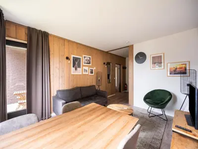 Ein Sitzbereich in der Unterkunft Cosy Apartment in Hambachtal Holiday Park