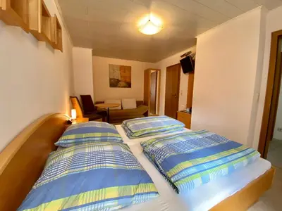 Ein Bett oder Betten in einem Zimmer der Unterkunft Gästehaus im Oberdorf