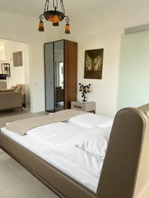 Ein Bett oder Betten in einem Zimmer der Unterkunft LOFT - Exclusive Penthousewohnung