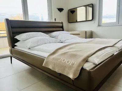 Ein Bett oder Betten in einem Zimmer der Unterkunft LOFT - Exclusive Penthousewohnung