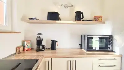 Küche/Küchenzeile in der Unterkunft Loft am Airport Hahn
