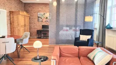 Ein Sitzbereich in der Unterkunft Loft am Airport Hahn