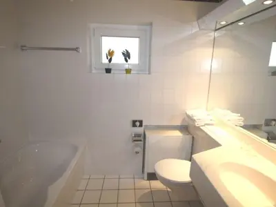 Ein Badezimmer in der Unterkunft Holiday Home Stausee by Interhome