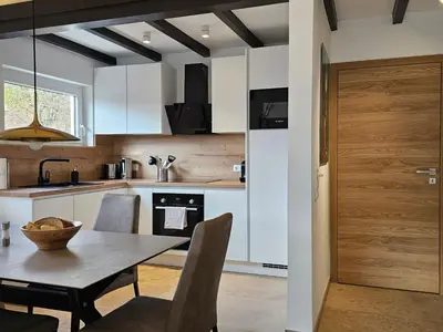 Küche/Küchenzeile in der Unterkunft Holiday Home mit Terrasse und Garten Südeifel by Interhome