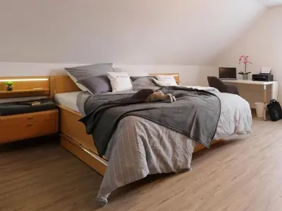 Ein Bett oder Betten in einem Zimmer der Unterkunft Apartment Appartement in Mastershausen mit Terrasse- Garten und Grill by Interhome