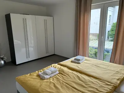 Ein Bett oder Betten in einem Zimmer der Unterkunft Ferienwohnung in Bendorf am Rhein