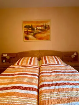 Ein Bett oder Betten in einem Zimmer der Unterkunft B&B Pension-Schönheim