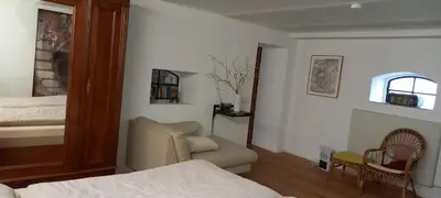 Ein Bett oder Betten in einem Zimmer der Unterkunft Romantic barn with sauna