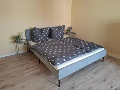 Ein Bett oder Betten in einem Zimmer der Unterkunft Holiday home Eifel, Nürburgring, Laacher See