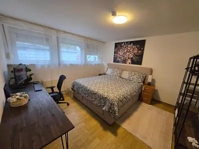 Ein Bett oder Betten in einem Zimmer der Unterkunft Tarforst Height Apartment, Trier