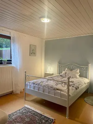 Ein Bett oder Betten in einem Zimmer der Unterkunft Gartenblick