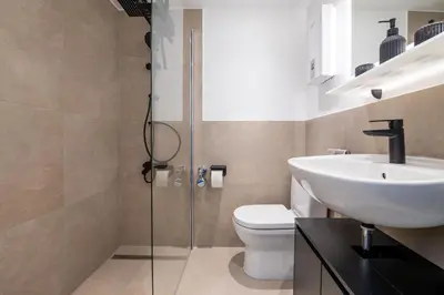 Ein Badezimmer in der Unterkunft City-Apartment mit Parkplatz, Balkon und Küche
