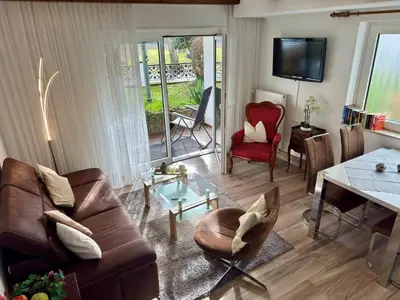 Ein Sitzbereich in der Unterkunft Haus Edeltrud - Ferienwohnung Moselufer