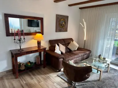 Ein Sitzbereich in der Unterkunft Haus Edeltrud - Ferienwohnung Moselufer